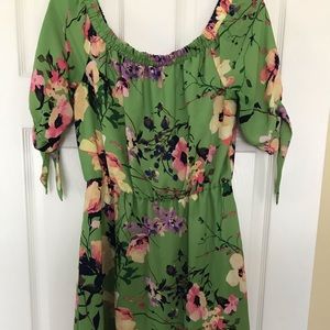 Vibrant, flowing knee length dress.